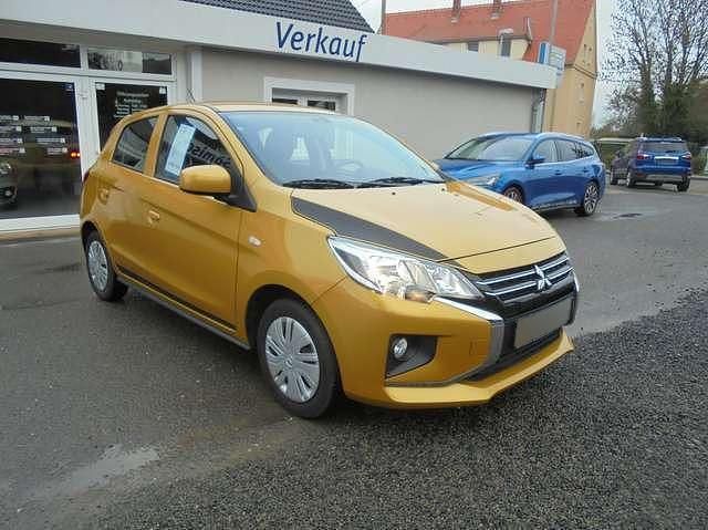 Gebraucht Mitsubishi Space Star Select 71 PS (52 kW) 2023 Gelb metallic Kleinwagen