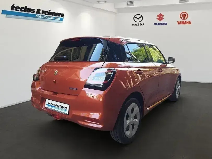 Neu Suzuki Swift Comfort 83 PS (61 kW) 2026 Flame orange pearl metallic Kleinwagen