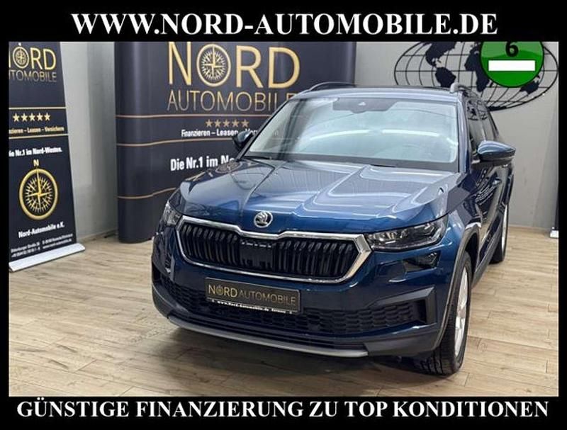 Lavablau metallic (metallic) Gebraucht 2022 Skoda Kodiaq Ambition SUV | 24.900 € (Fairer Preis) - Bild 1/3