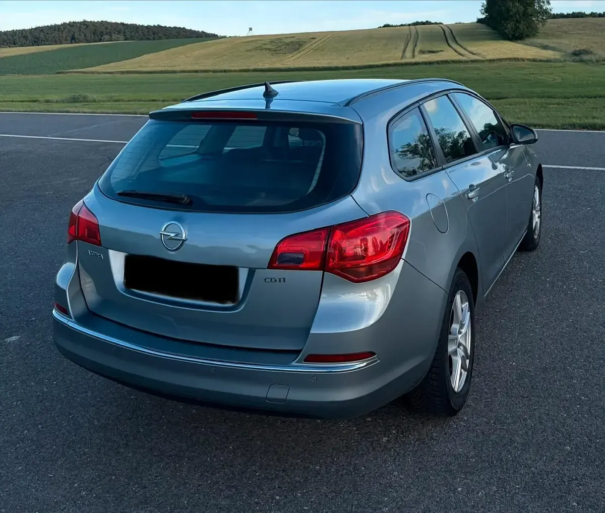 Gebraucht Opel Astra 110 PS (80 kW) 2014 Grau Kombi