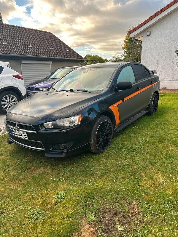Schwarz Gebraucht 2012 Mitsubishi Lancer Limousine | 3.500 € (Fairer Preis) - Bild 1/4