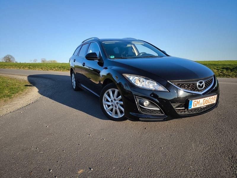 Second-hand Mazda 6 Inclusive 120 CP (88 kW) 2011 Negru Break