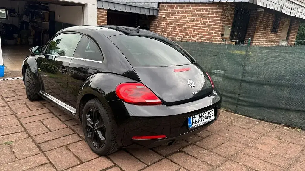 Gebraucht VW Beetle Exclusive 105 PS (77 kW) 2014 Schwarz Kleinwagen