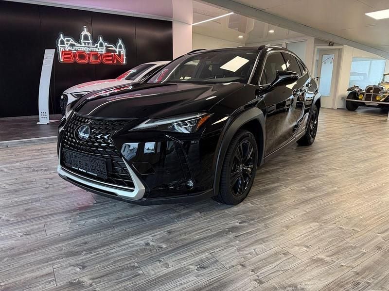 Schwarz Gebraucht 2021 Lexus UX 250h SUV | 25.999 € (Fairer Preis) - Bild 1/4