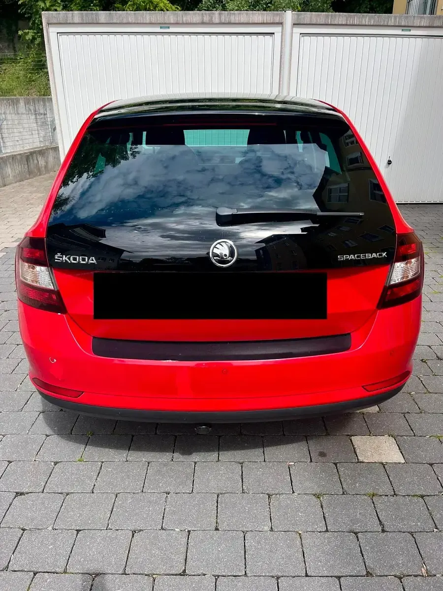 Używany Skoda Rapid Ambition 105 KM (77 kW) 2014 Czerwony Hatchback