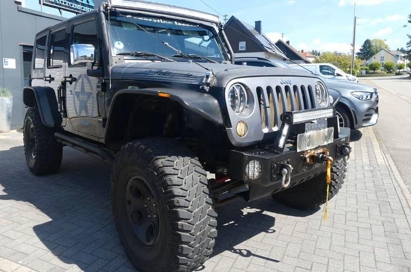 Schwarz Gebraucht 2011 Jeep Wrangler Sahara SUV | 29.800 € (Fairer Preis) - Bild 1/4
