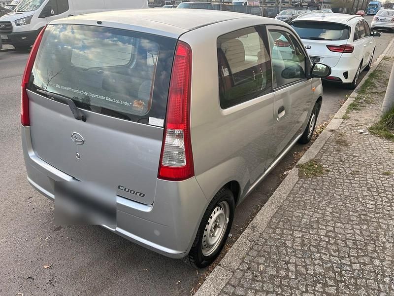 Gebraucht Daihatsu Cuore 58 PS (42 kW) 2004 Grau Kleinwagen