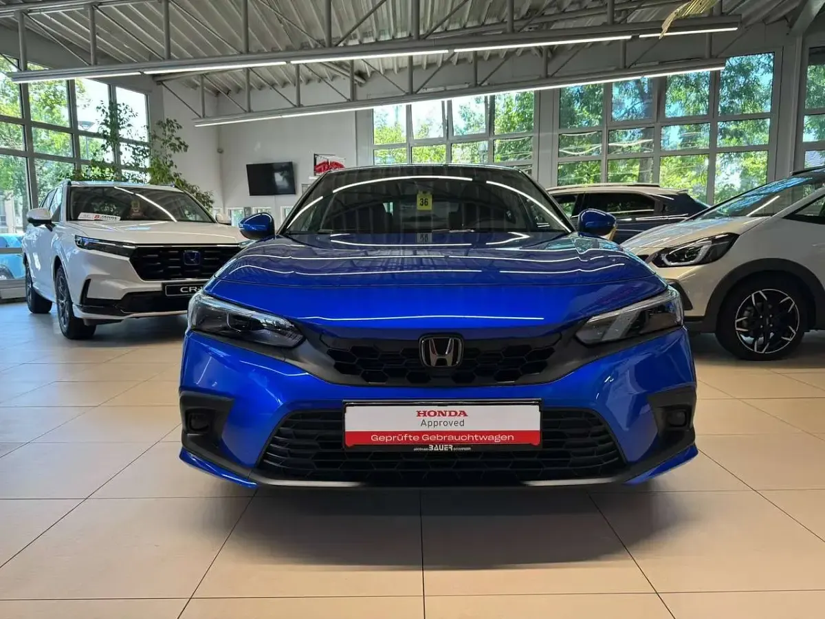 Gebraucht Honda Civic Elegance 184 PS (135 kW) 2024 Prem crystal blue m Limousine