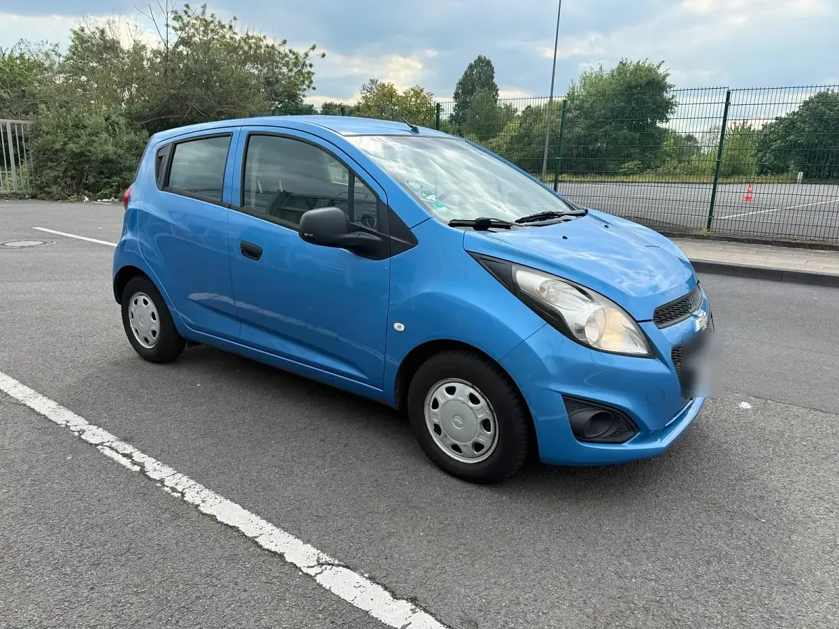 Używany Chevrolet Spark 68 KM (50 kW) 2013 Niebieski Hatchback