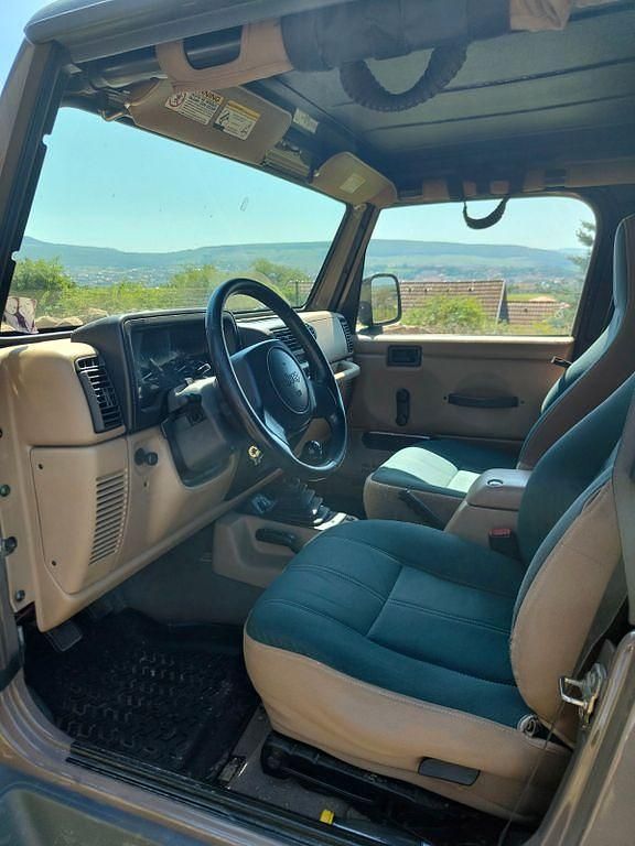 Braun Gebraucht 1999 Jeep Wrangler Sahara SUV | 17.500 € (Superpreis) - Bild 1/4