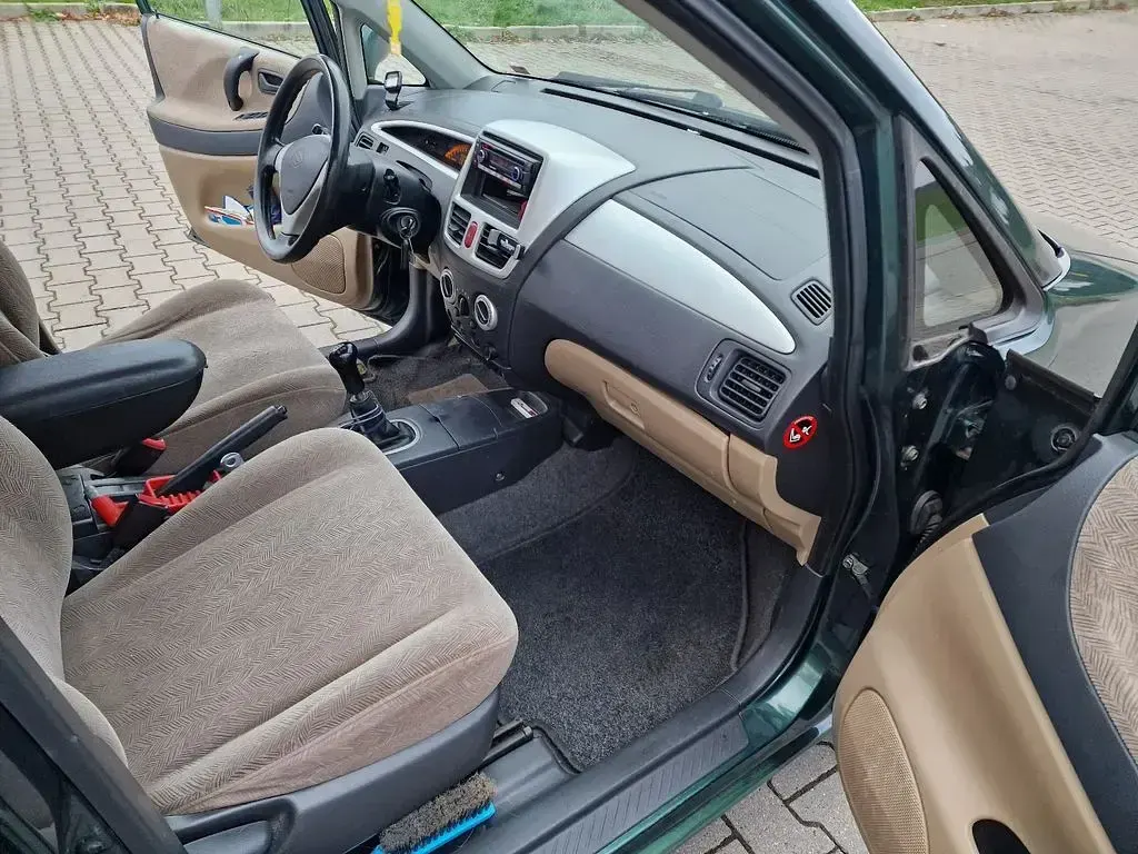 Gebraucht Suzuki Liana 103 PS (75 kW) 2001 Grün Limousine