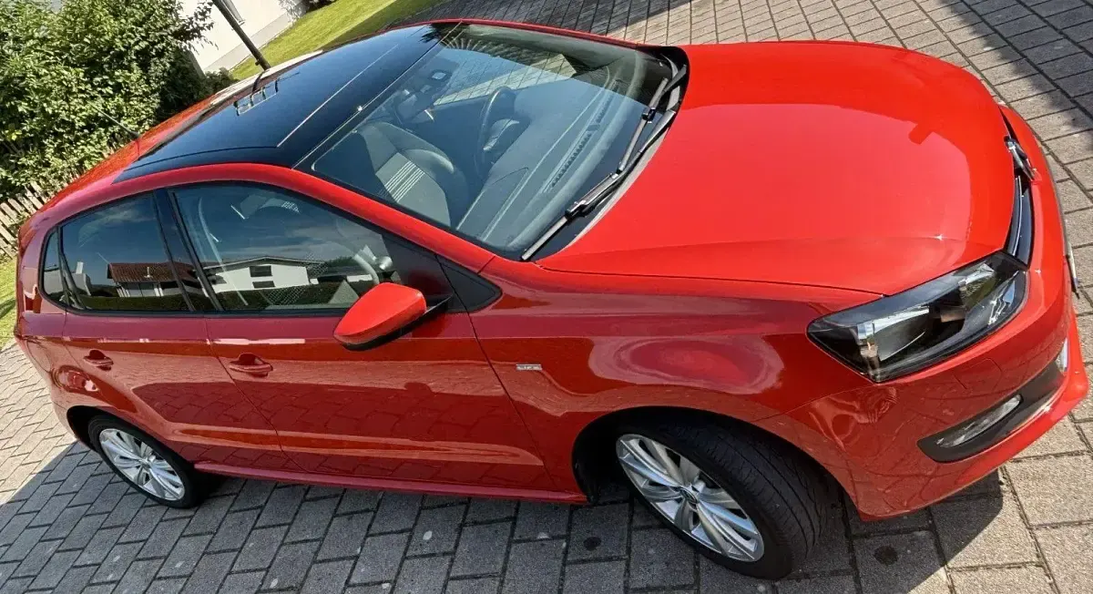 Gebraucht VW Polo Life 90 PS (66 kW) 2013 Orange Kleinwagen