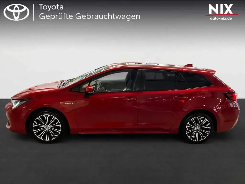 Gebraucht Toyota Corolla Team 122 PS (89 kW) 2021 Karminarot metallic Kombi