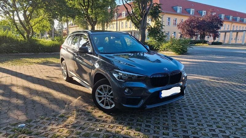 Grau Gebraucht 2018 BMW X1 SUV | 15.999 € (Superpreis) - Bild 1/4