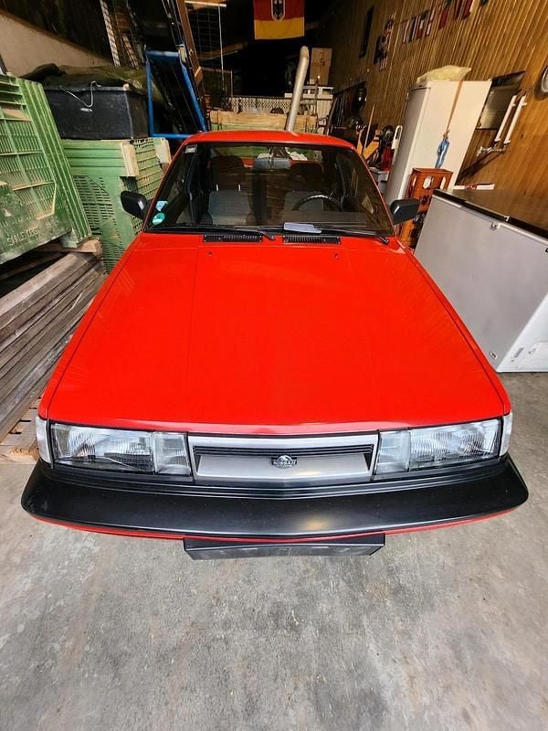 Gebraucht Nissan Sunny 90 PS (66 kW) 1990 Rot Coupé