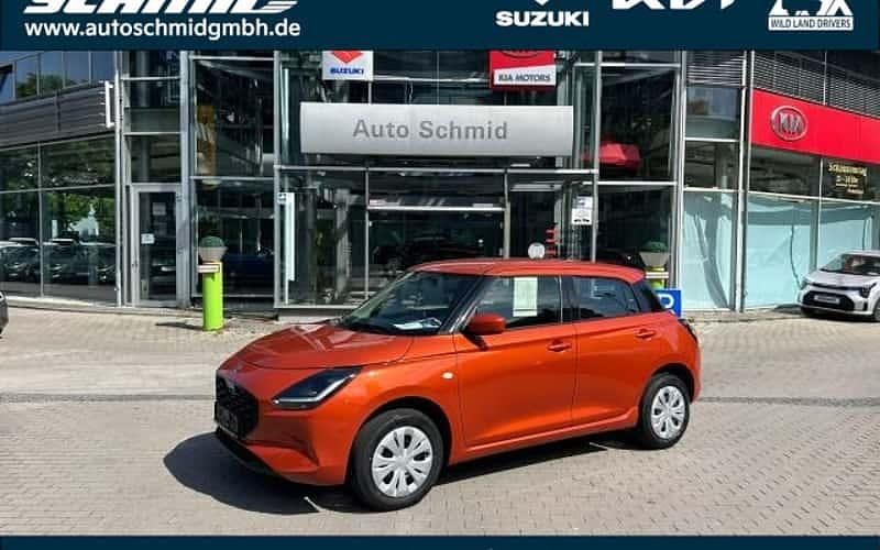 Orange Neu 2025 Suzuki Swift Club Limousine | 16.990 € - Bild 1/4