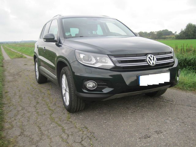 Grün metallic Gebraucht 2012 VW Tiguan Track & Field SUV | 12.700 € (Etwas zu teuer) - Bild 1/4