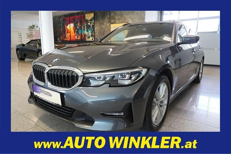 Silber Gebraucht 2021 BMW 330e Sport Line Kombi | 24.960 € (Guter Preis) - Bild 1/4