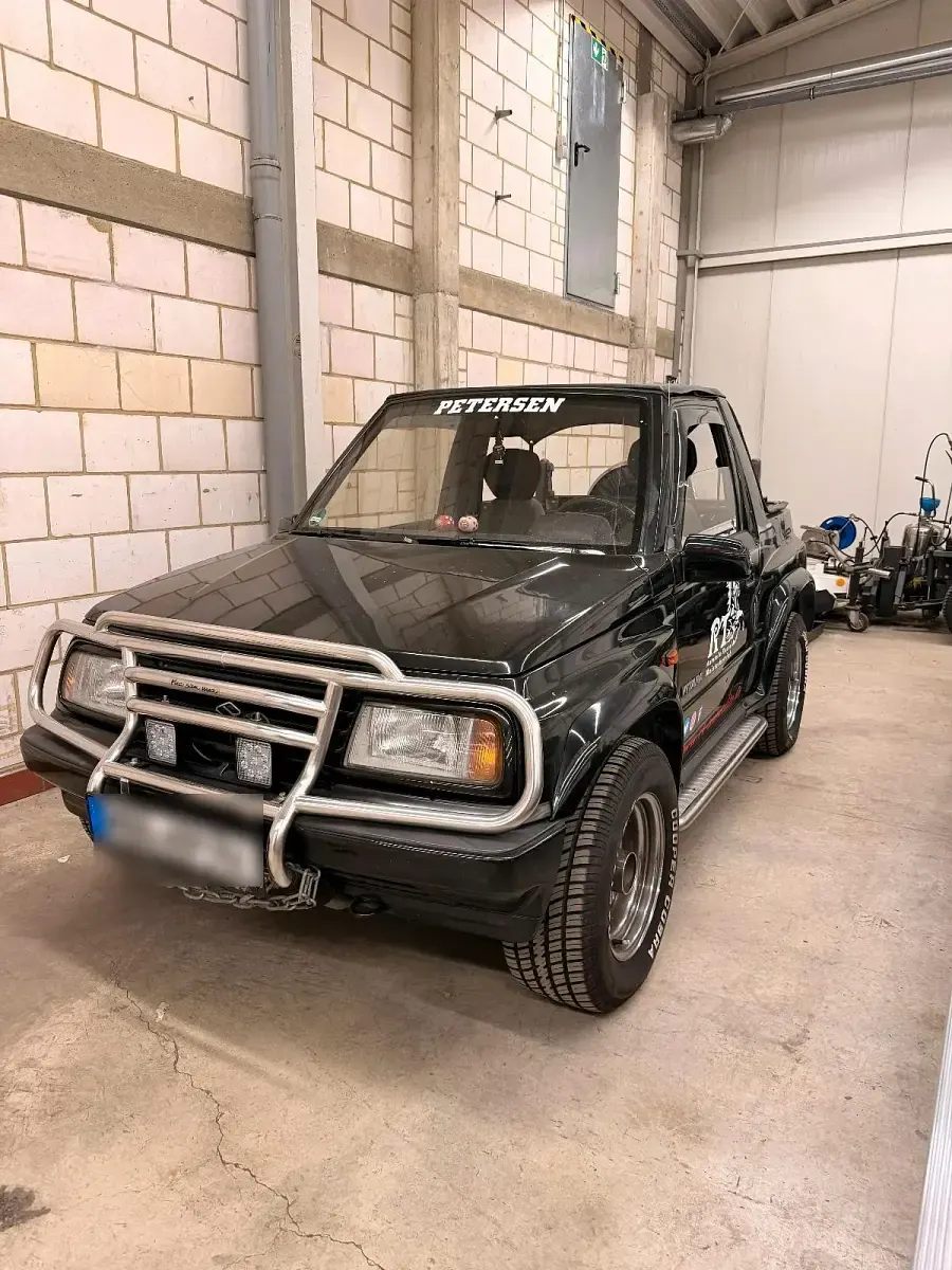 Gebraucht Suzuki Vitara 82 PS (60 kW) 1991 Schwarz Cabrio