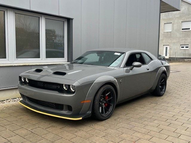 Go mango Neu 2024 Dodge Challenger Coupé | 129.700 € - Bild 1/4