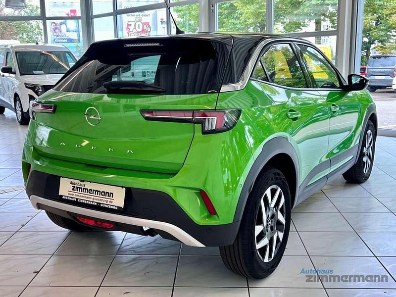 Gebraucht Opel Mokka Elegance 101 PS (74 kW) 2021 Matcha green/ikone gruen SUV