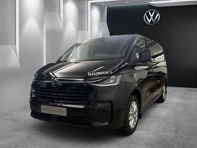 Midnight black metallic Gebraucht 2025 VW Caravelle Van / Kleinbus | 74.732 € (Superpreis) - Bild 1/4