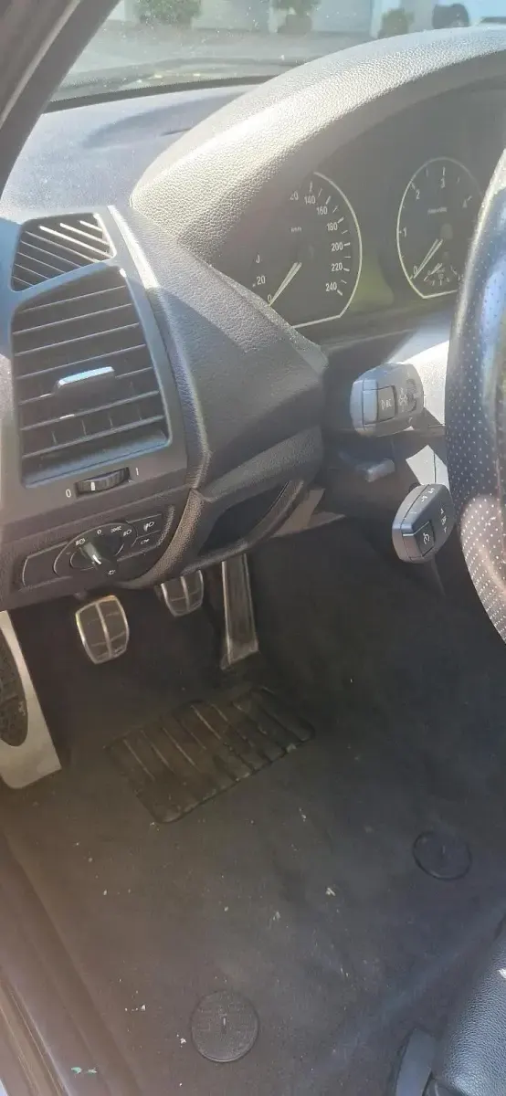 Second-hand BMW 120 177 CP (130 kW) 2010 Negru Hatchback