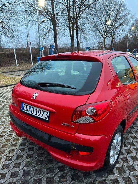 Gebraucht Peugeot 206+ 60 PS (44 kW) 2009 Rot Kleinwagen