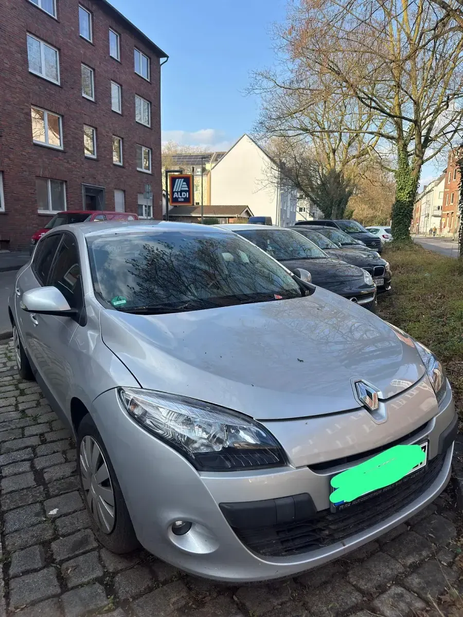 Używany Renault Mégane 110 KM (80 kW) 2009 Szary Sedan/Limuzyna