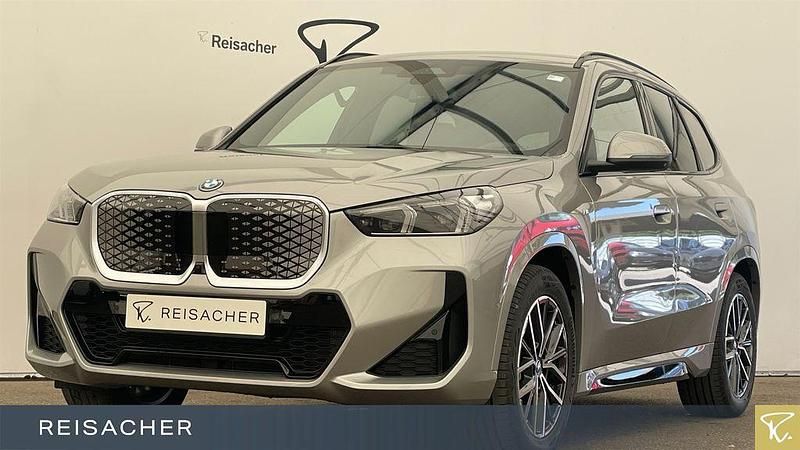 Silber Neu 2025 BMW iX1 Performance SUV | 54.995 € (Fairer Preis) - Bild 1/4