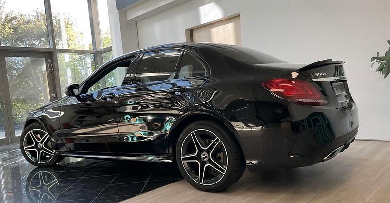 Schwarz Gebraucht 2021 Mercedes C300e AMG line Limousine | 27.500 € (Fairer Preis) - Bild 1/4