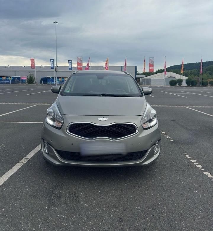 Grau Gebraucht 2014 Kia Carens 2 Van / Kleinbus | 9.999 € (Fairer Preis) - Bild 1/4