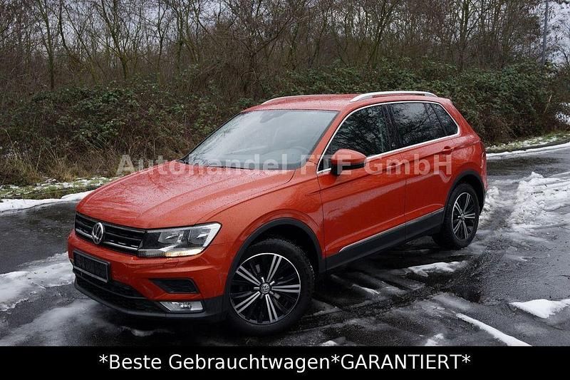 Orange Gebraucht 2017 VW Tiguan Sound SUV | 12.499 € (Teuer) - Bild 1/4