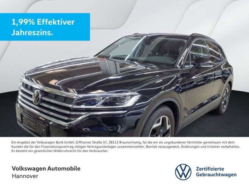 Grenadillschwarz metallic Gebraucht 2024 VW Touareg Basis SUV | 53.490 € (Superpreis) - Bild 1/3