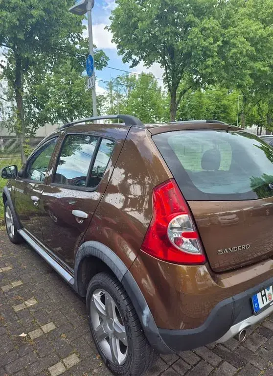 Gebraucht Dacia Sandero Stepway 84 PS (61 kW) 2012 Braun Limousine