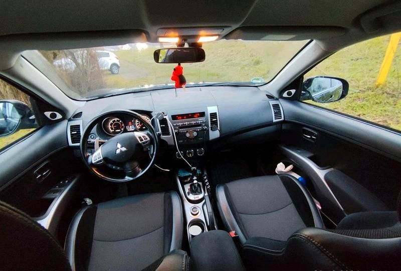 Gebraucht Mitsubishi Outlander Top 166 PS (122 kW) 2011 Schwarz SUV