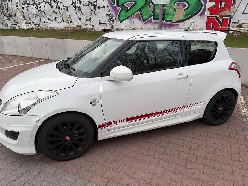 Second-hand Suzuki Swift 94 CP (69 kW) 2013 Alb Hatchback