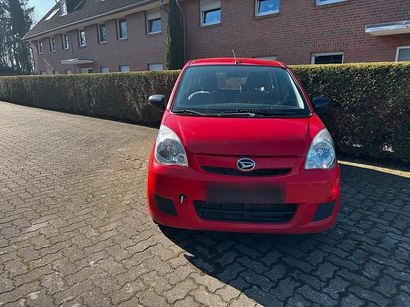 Gebraucht Daihatsu Cuore 69 PS (50 kW) 2011 Rot Kleinwagen