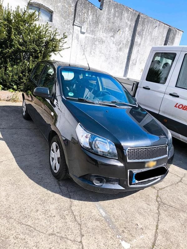 Second-hand Chevrolet Aveo 85 CP (62 kW) 2011 Negru Hatchback