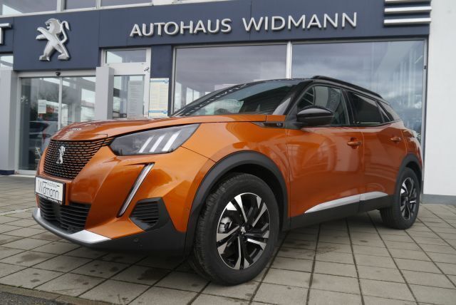 Orange fusion metallic Gebraucht 2023 Peugeot e-2008 GTi SUV | 19.895 € (Guter Preis) - Bild 1/4