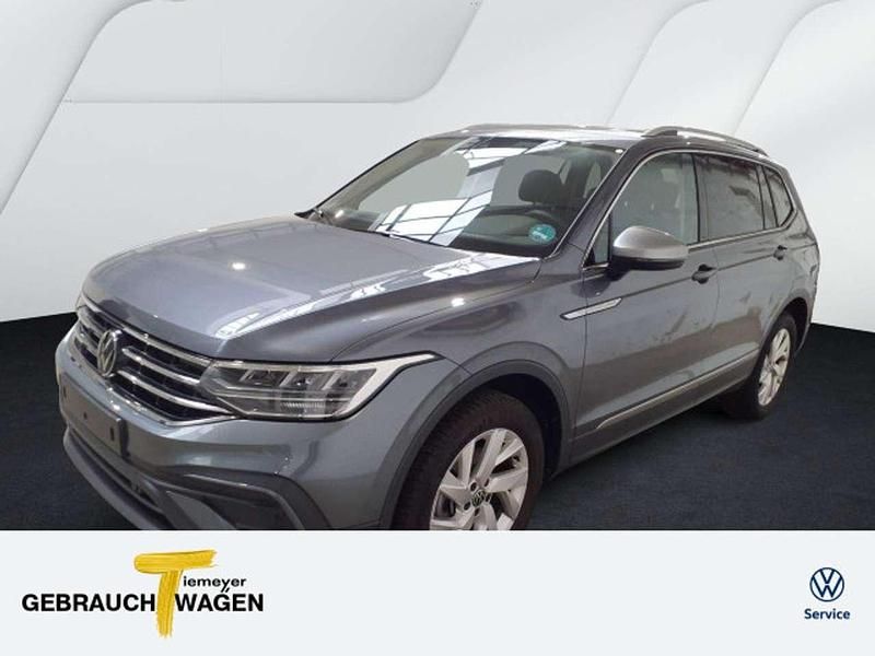 Grau Gebraucht 2024 VW Tiguan Allspace Life SUV | 33.870 € (Superpreis) - Bild 1/4