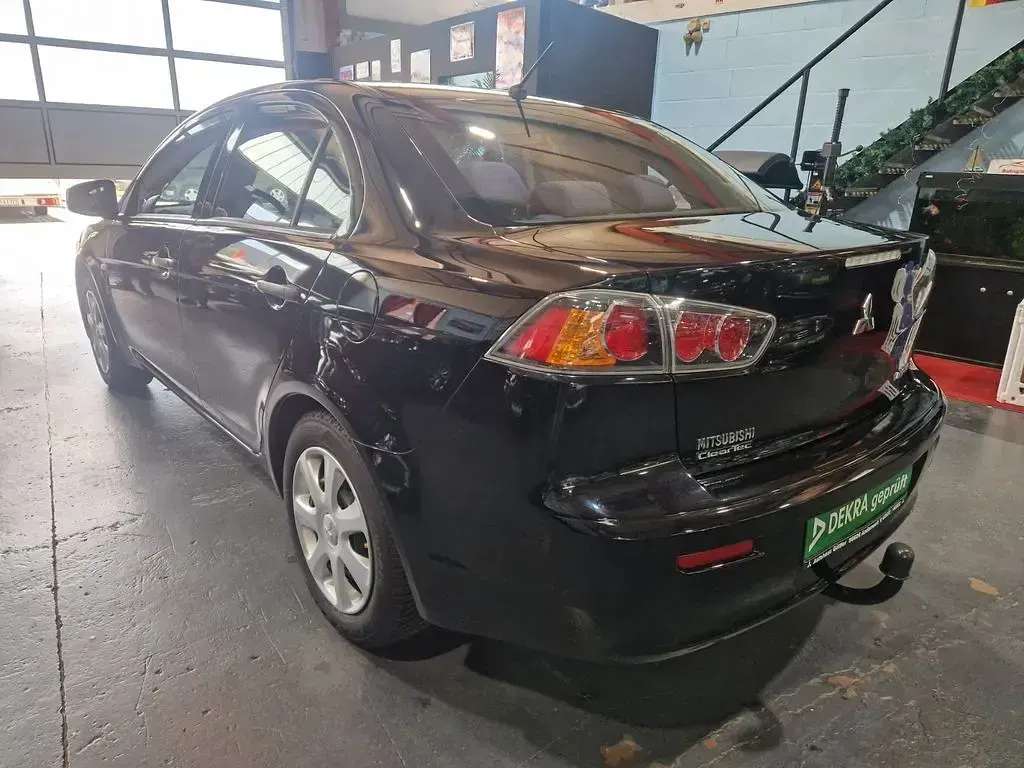 Begagnad Mitsubishi Lancer 117 HK (86 kW) 2015 Svart Sedan