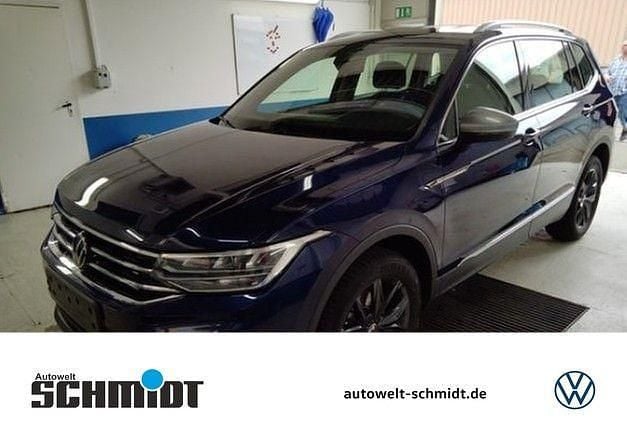 Atlanticbluemetallic Gebraucht 2024 VW Tiguan R SUV | 33.998 € (Superpreis) - Bild 1/4