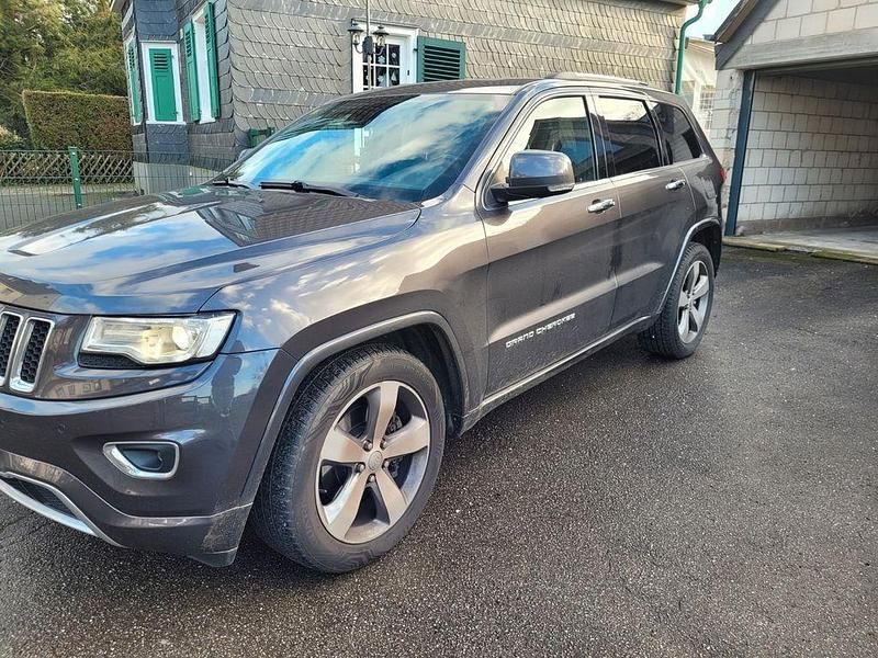 Grau Gebraucht 2015 Jeep Grand Cherokee SUV | 22.999 € (Fairer Preis) - Bild 1/4