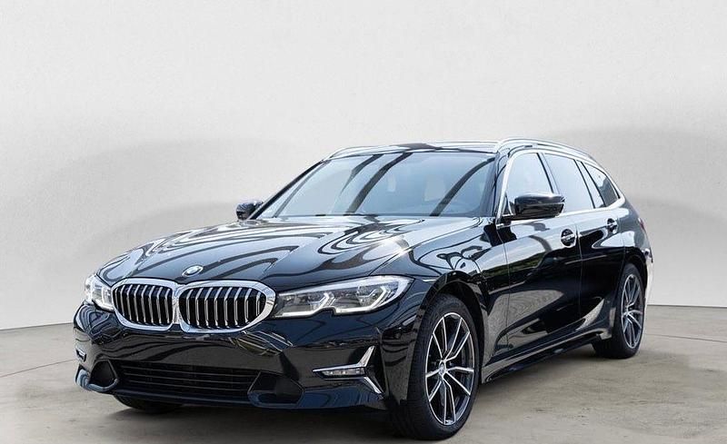 Schwarz Gebraucht 2021 BMW 320 Luxury Line Kombi | 23.999 € (Superpreis) - Bild 1/4