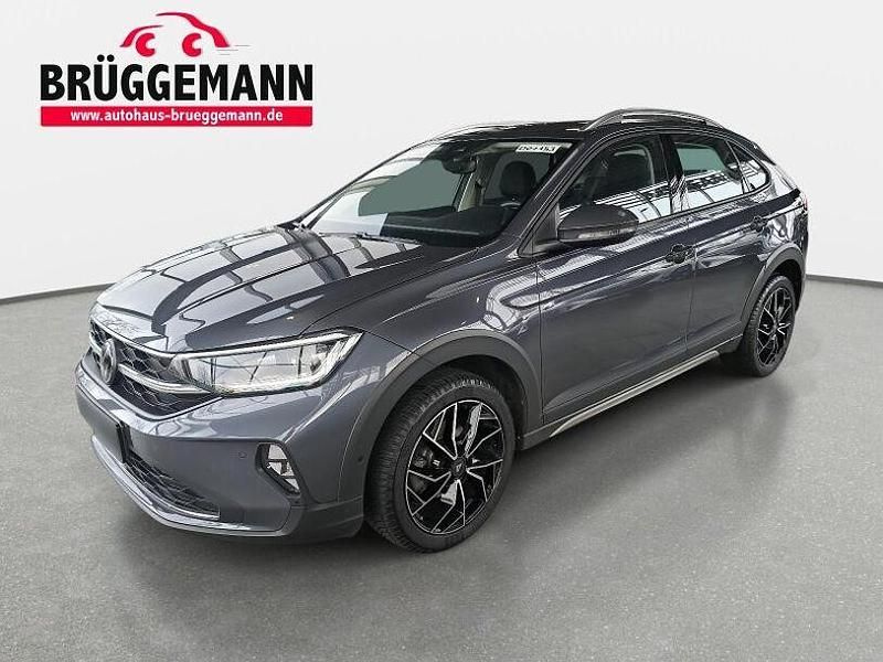 Grau Gebraucht 2023 VW Taigo IQ Drive SUV | 22.490 € (Fairer Preis) - Bild 1/4