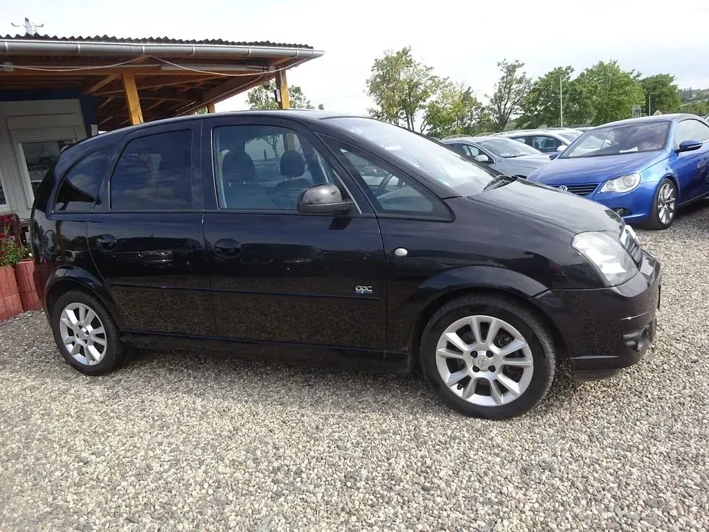Gebraucht Opel Meriva Innovation 105 PS (77 kW) 2010 Schwarz Van / Kleinbus