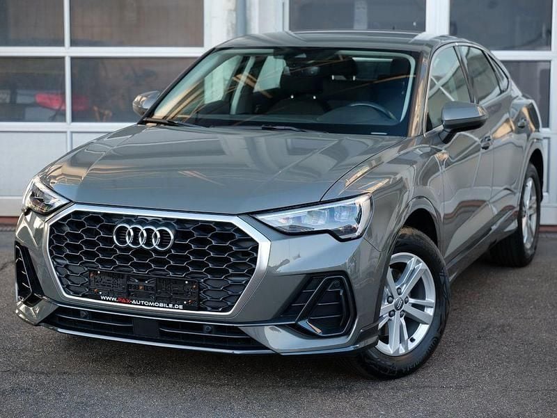 Grau Gebraucht 2020 Audi Q3 Sportback Basis SUV | 23.800 € (Guter Preis) - Bild 1/4