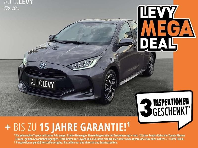 Grau Gebraucht 2021 Toyota Yaris Hybrid Basis Kleinwagen | 18.790 € (Fairer Preis) - Bild 1/4
