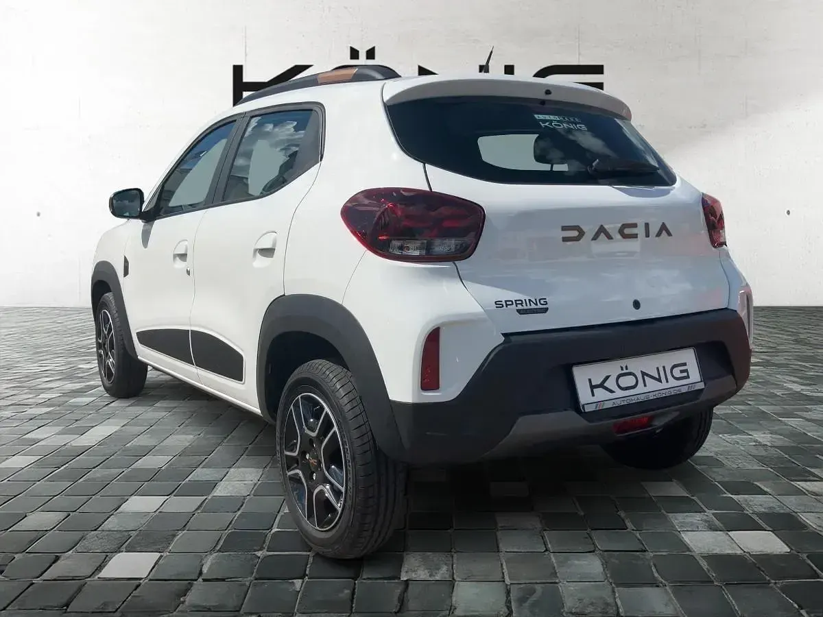 Gebraucht Dacia Spring Extreme 47 kW (65 PS) 2023 Weiß Kleinwagen